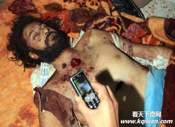 卡扎菲儿子穆塔西姆甚为壮烈 临刑前表情冷静(组图)